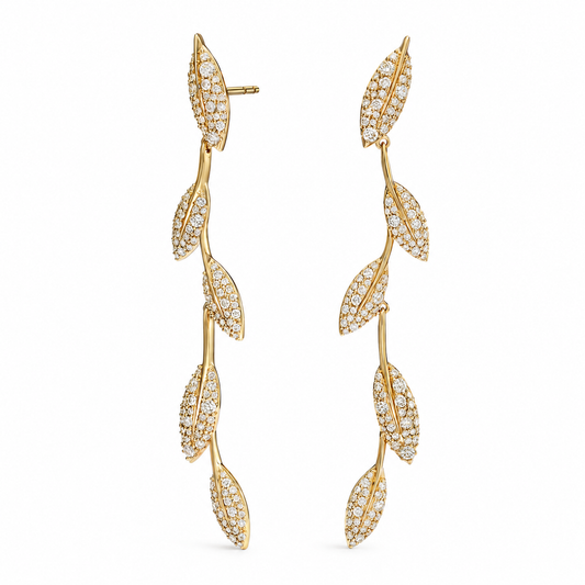 Olive branch pavé duster earrings on model, close-up