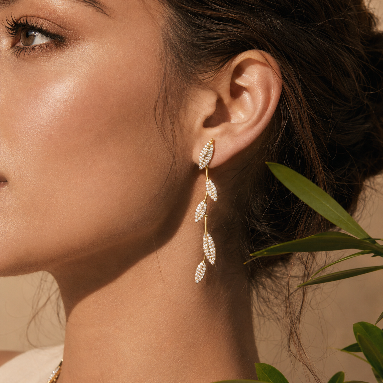 Olive branch pavé duster earrings, detail view