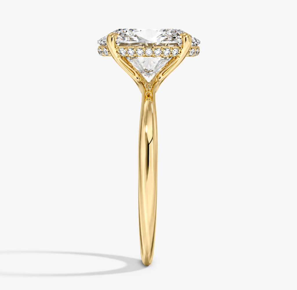 Hidden halo engagement ring in 14K/18K yellow gold, close-up detail