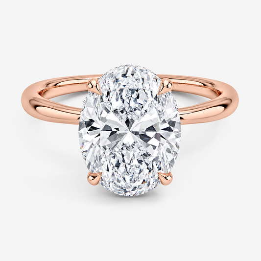 Hidden halo engagement ring in 14K rose gold, front view